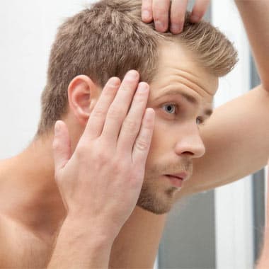 ۱۲ راه جلوگیری از کم پشت شدن مو